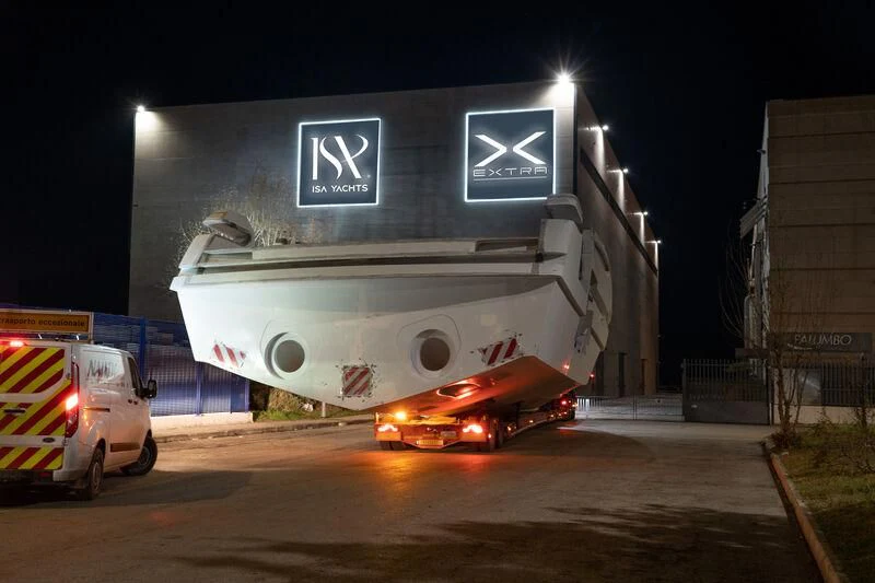 a group of emergency vehicles on a road at night aboard IL SOGNO Yacht for Sale