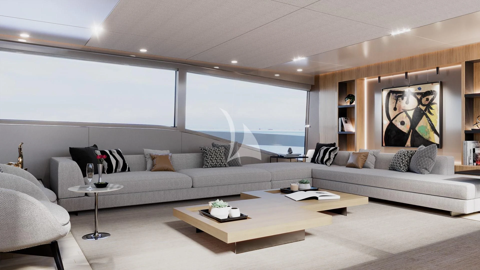 a living room with a large white sofa and a coffee table aboard IL SOGNO Yacht for Sale