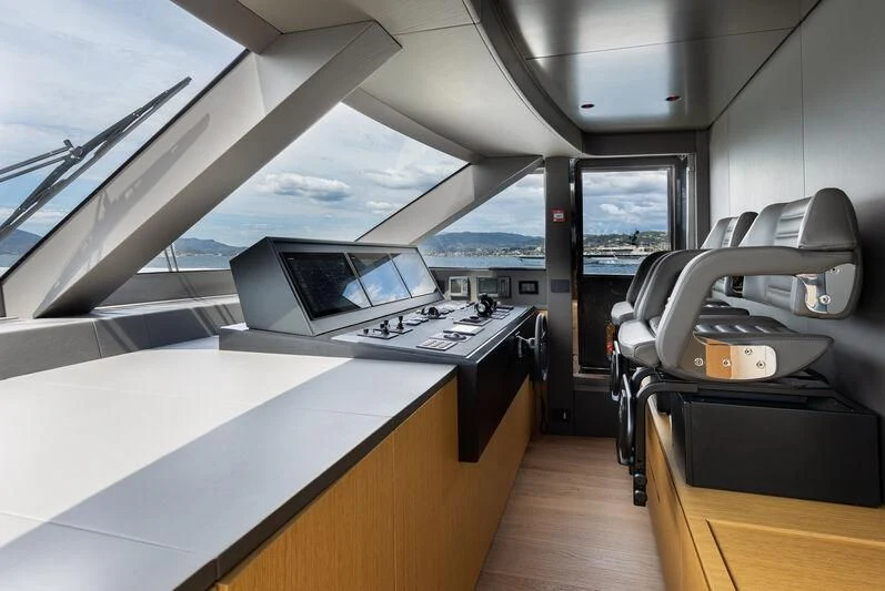 inside of a vehicle with a laptop and a desk aboard IL SOGNO Yacht for Sale
