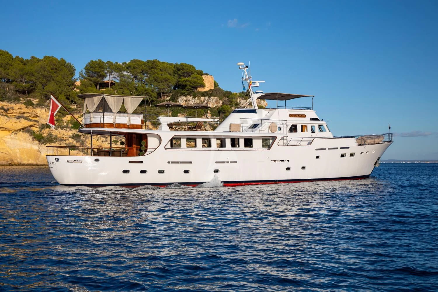 a boat on the water aboard ODYSSEY III Yacht for Sale