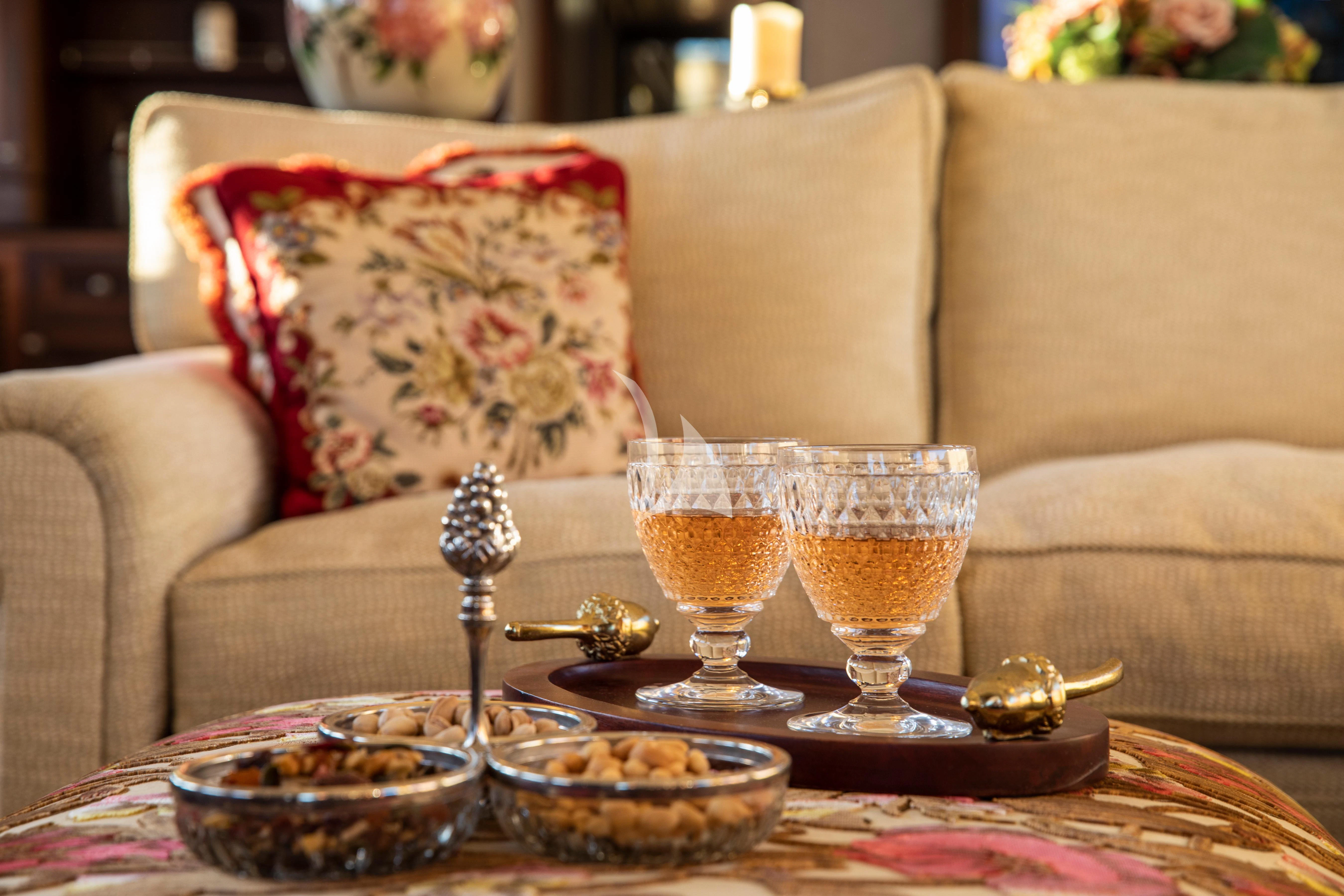 a glass of wine on a table aboard ODYSSEY III Yacht for Sale