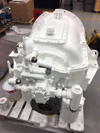 a white robot with black legs aboard ODYSSEY III Yacht for Sale