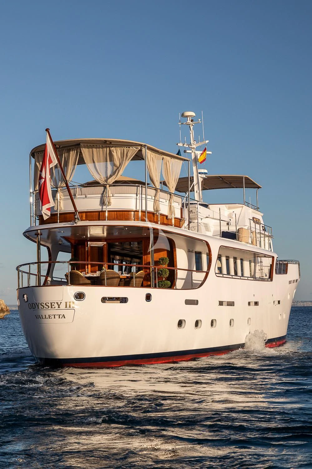a boat on the water aboard ODYSSEY III Yacht for Sale