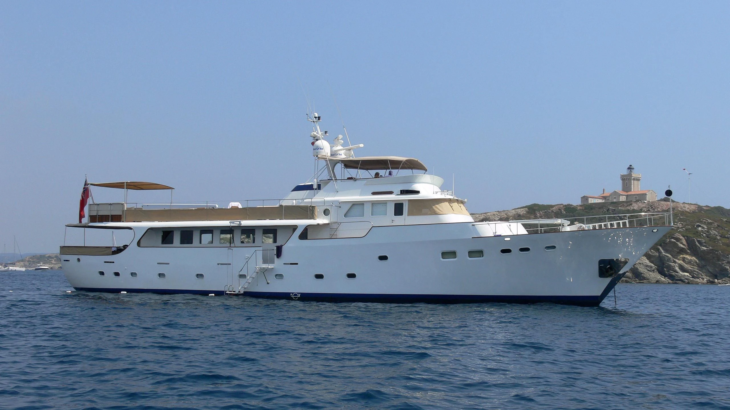a large white boat in the water aboard ODYSSEY III Yacht for Sale