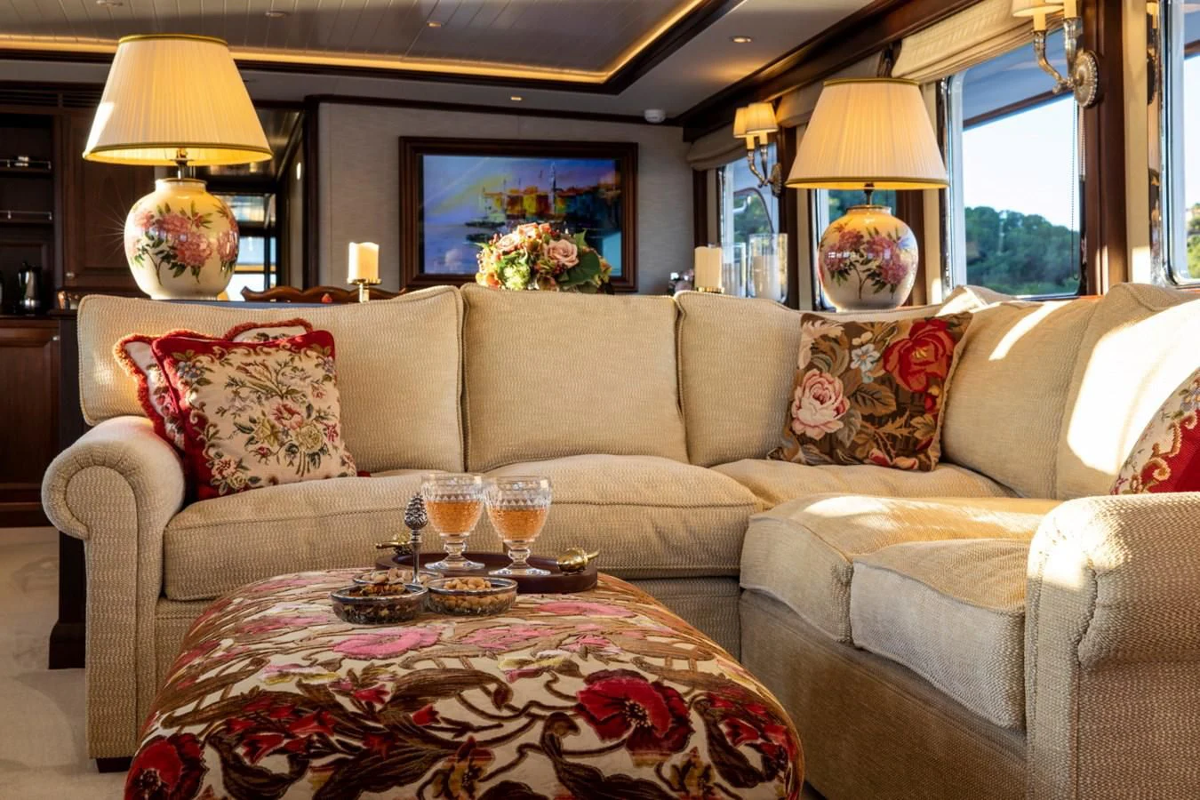 a living room with a couch and a table aboard ODYSSEY III Yacht for Sale