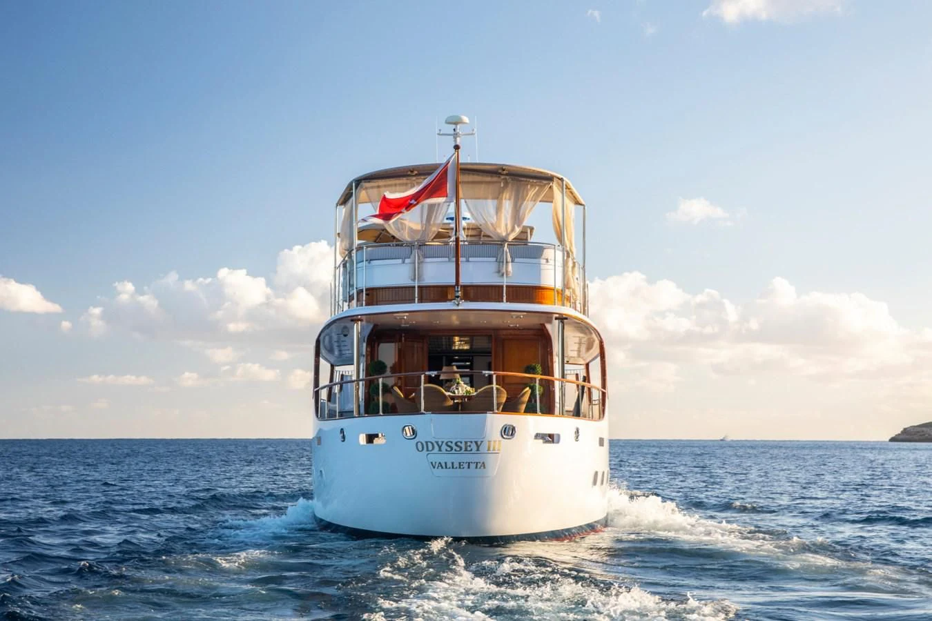 a boat on the water aboard ODYSSEY III Yacht for Sale