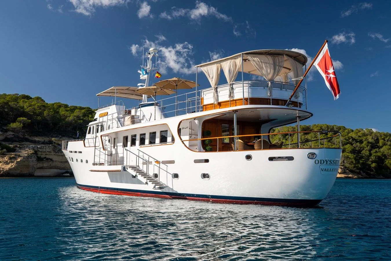a boat on the water aboard ODYSSEY III Yacht for Sale