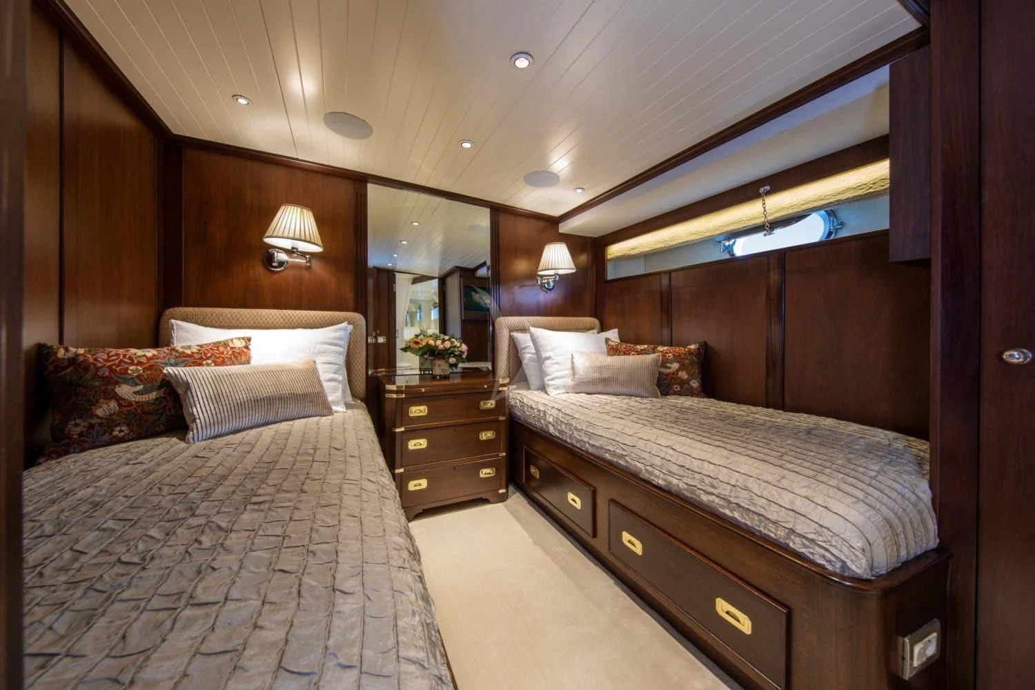a room with two beds aboard ODYSSEY III Yacht for Sale