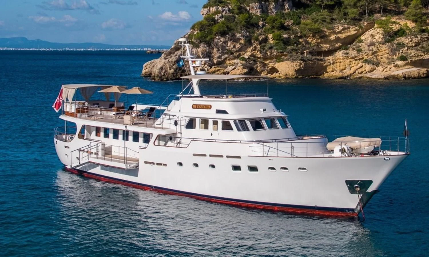 a boat on the water aboard ODYSSEY III Yacht for Sale