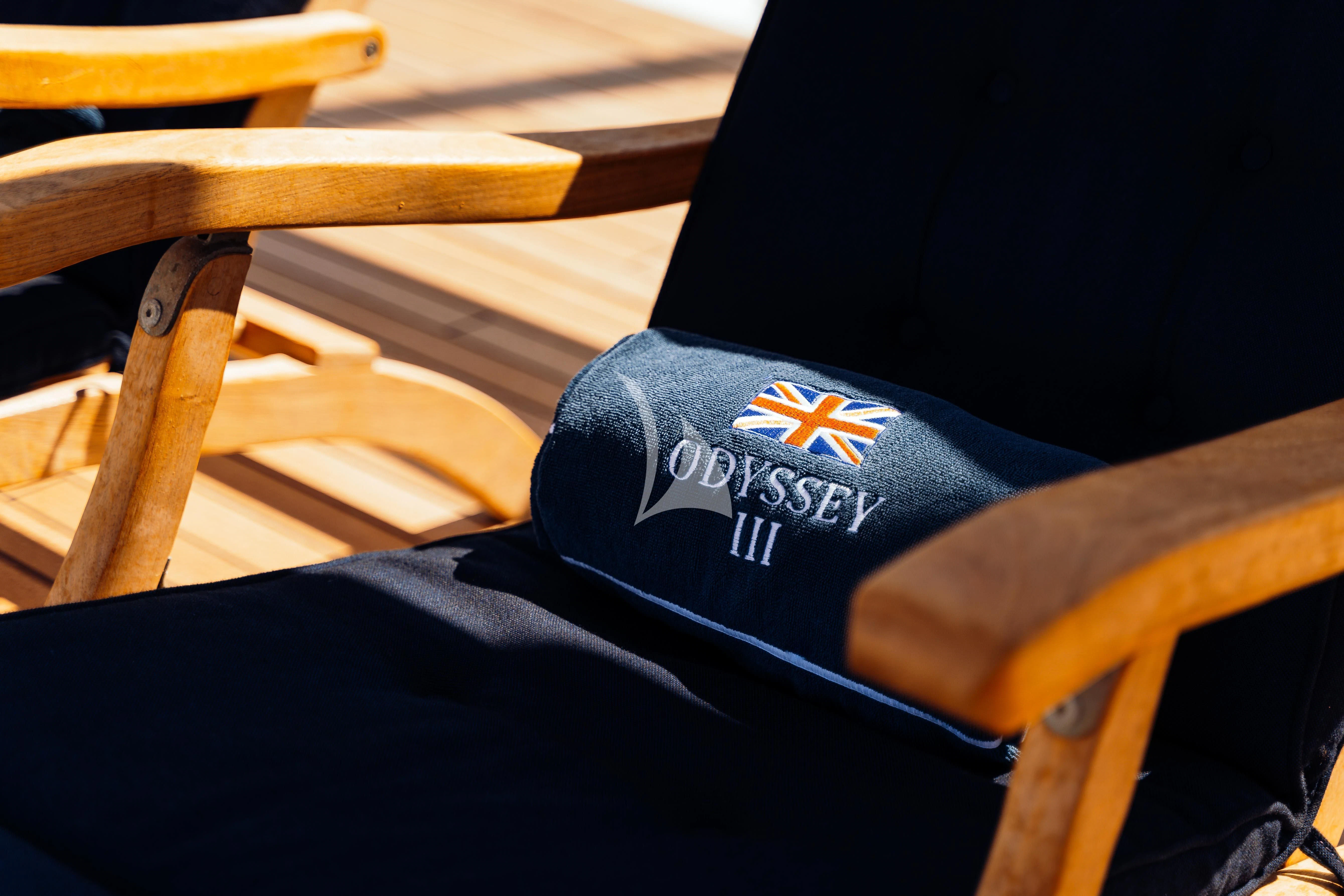 a hat on a chair aboard ODYSSEY III Yacht for Sale
