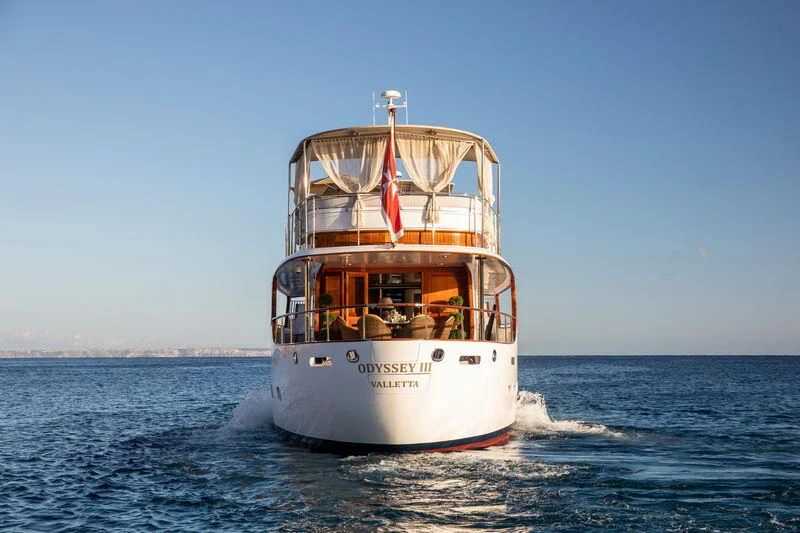 a boat on the water aboard ODYSSEY III Yacht for Sale