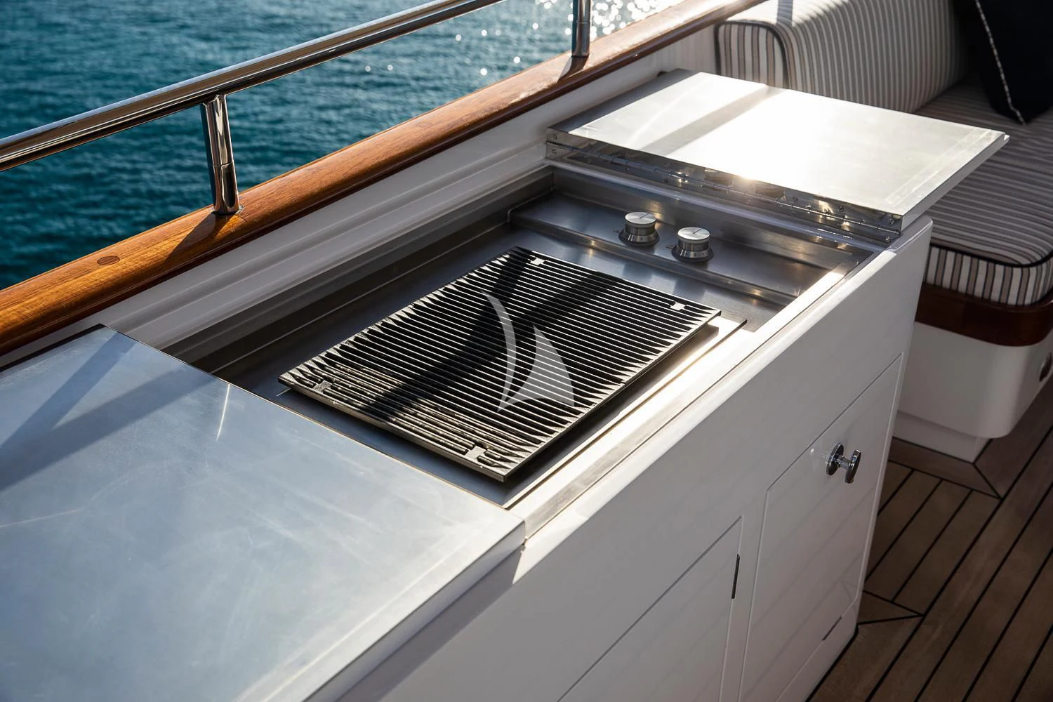 a white and black piano aboard ODYSSEY III Yacht for Sale