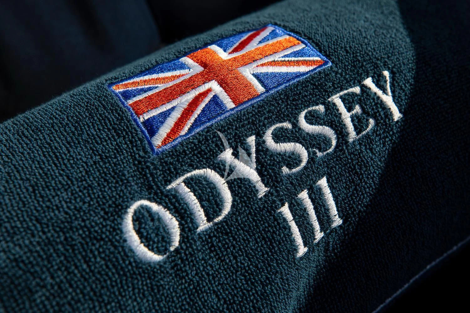 a blue and red flag aboard ODYSSEY III Yacht for Sale