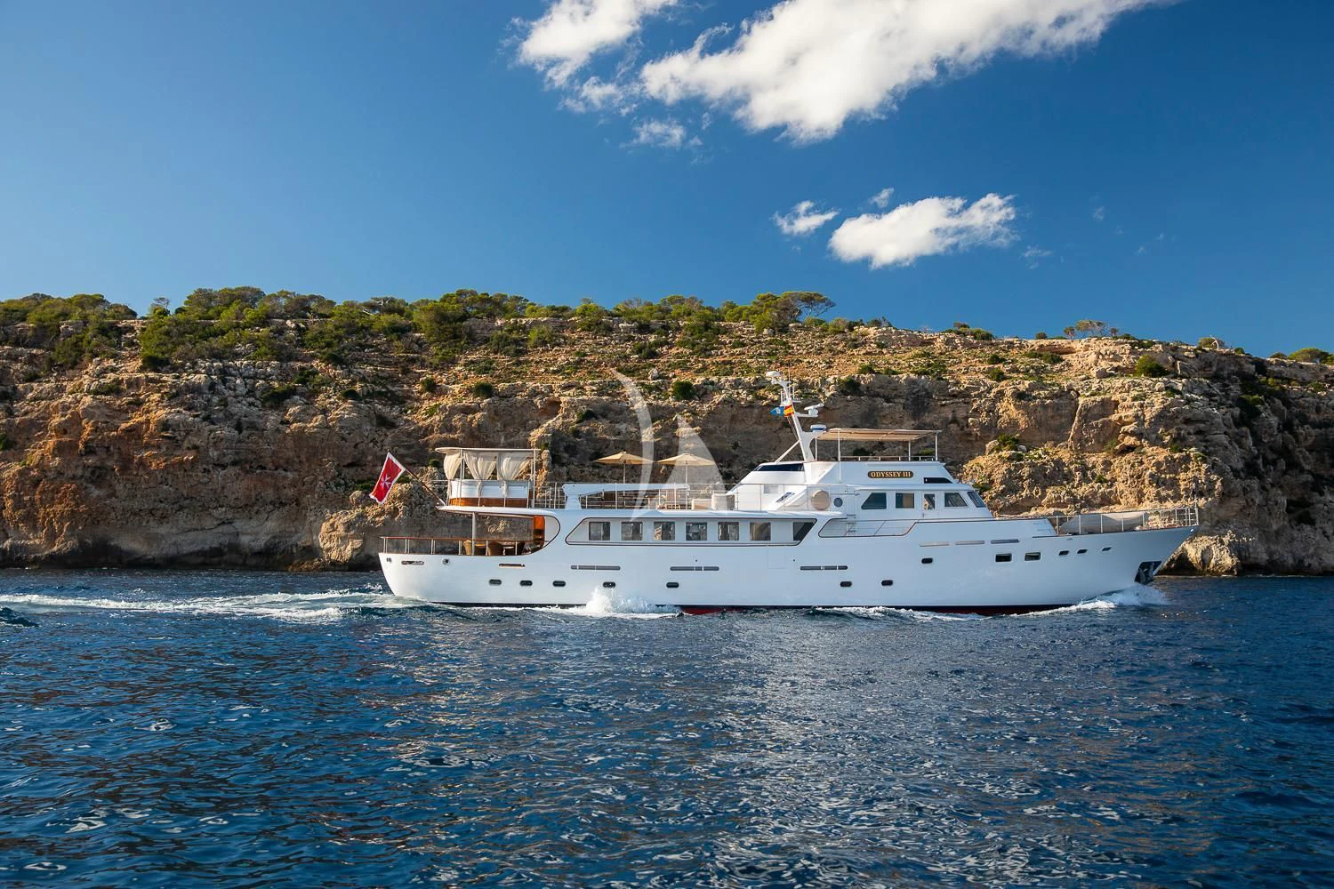 a boat on the water aboard ODYSSEY III Yacht for Sale