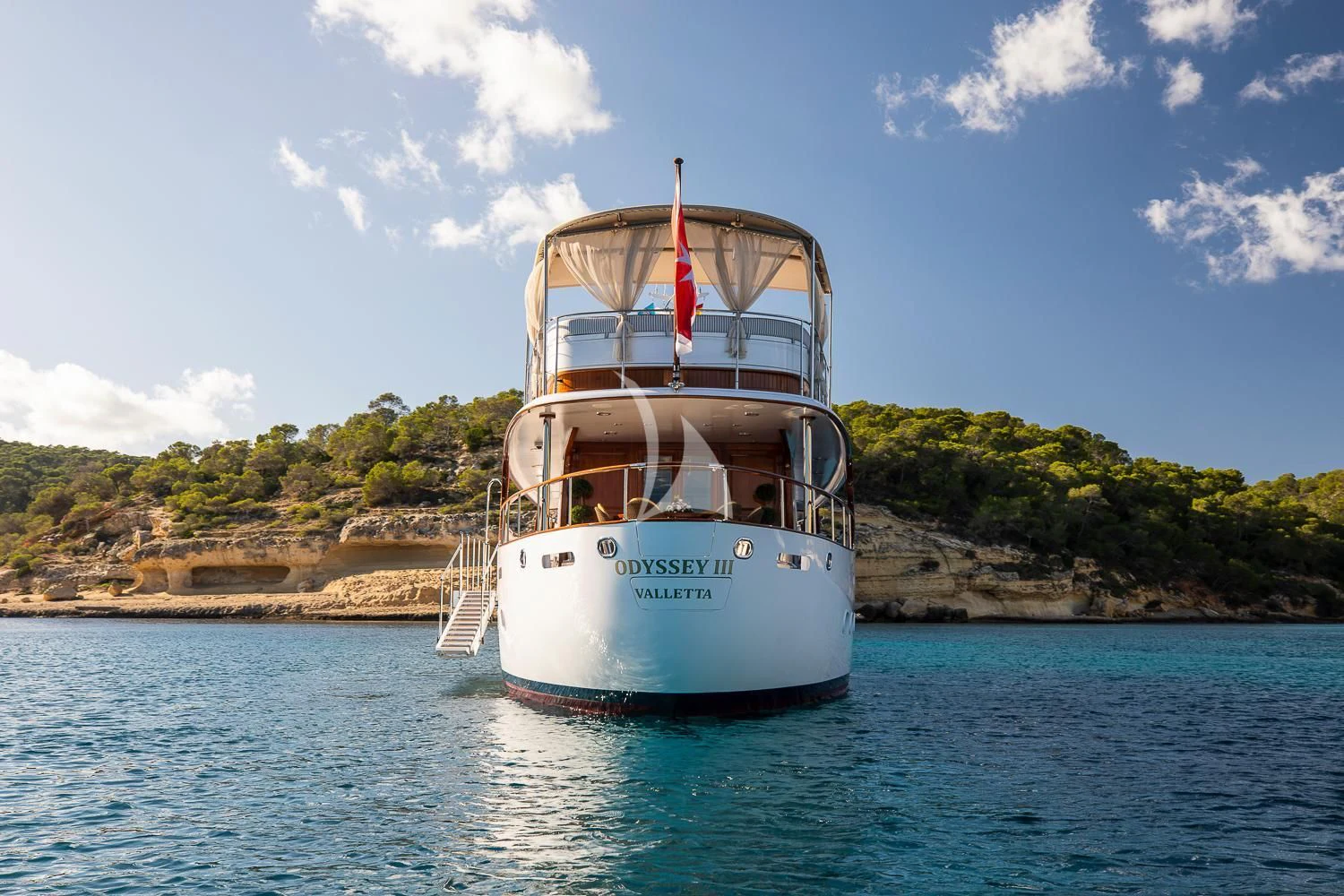 a boat on the water aboard ODYSSEY III Yacht for Sale