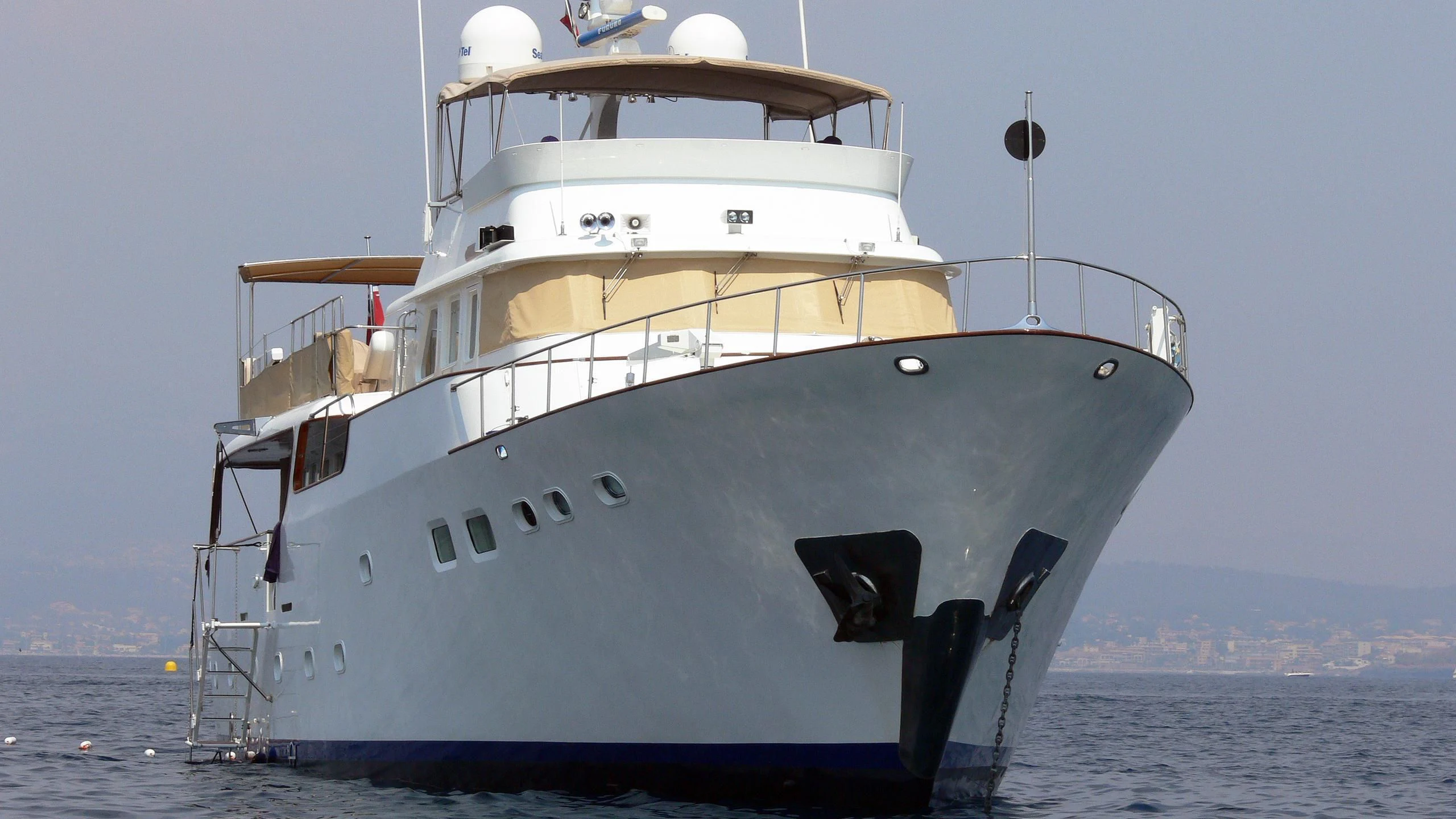 a large white ship aboard ODYSSEY III Yacht for Sale