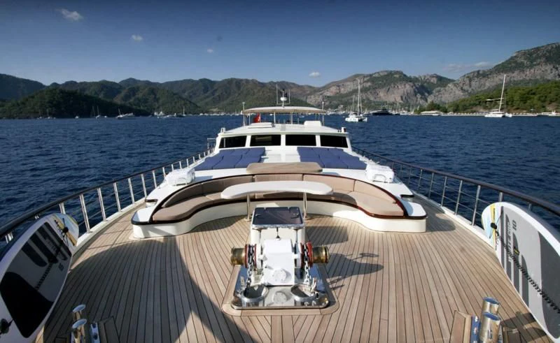 a boat on a body of water aboard ALWAYS SMILE Yacht for Charter