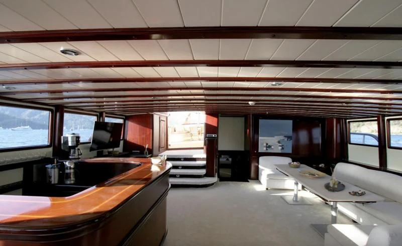 an empty office with a large window aboard ALWAYS SMILE Yacht for Charter