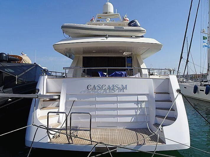 a boat docked at a pier aboard CASCAIS M Yacht for Sale