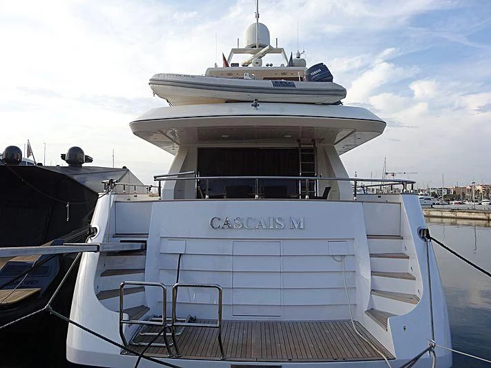 a boat docked at a pier aboard CASCAIS M Yacht for Sale