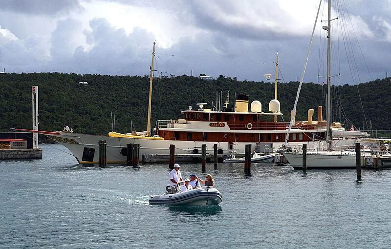 a boat is parked at a dock aboard ARRIVA Yacht for Sale