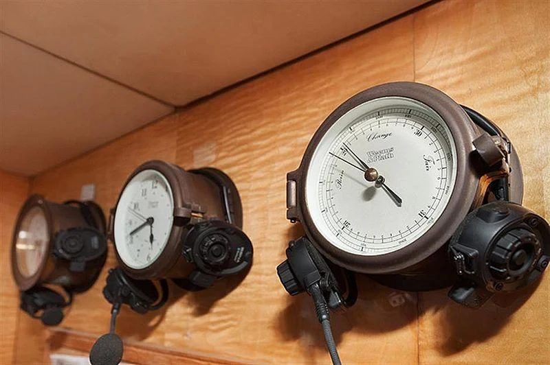 a couple of watches on a table aboard ALL OF ME Yacht for Sale
