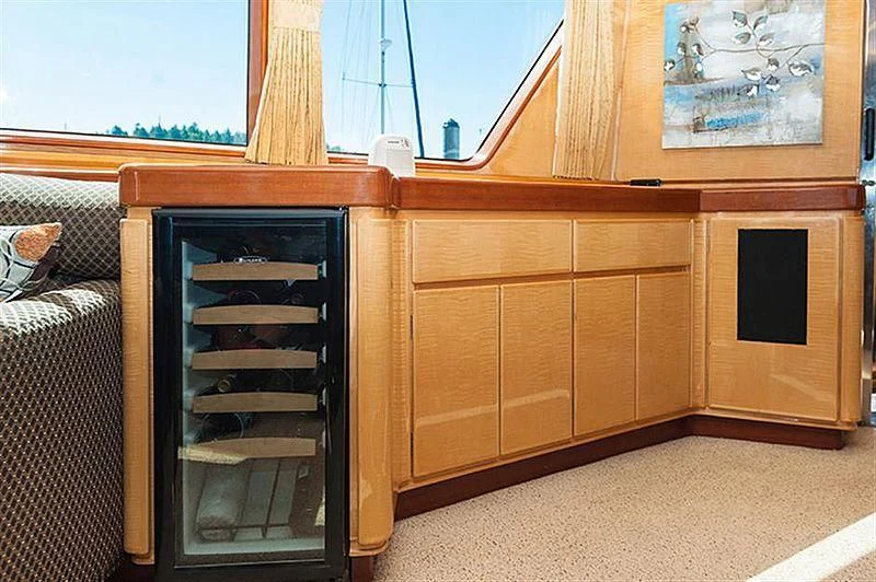 a room with wooden cabinets aboard ALL OF ME Yacht for Sale
