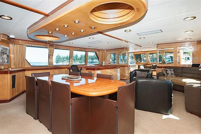 a train car with a table and chairs aboard ALL OF ME Yacht for Sale