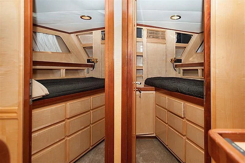 a room with a closet and a bed aboard ALL OF ME Yacht for Sale