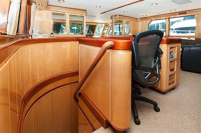 a chair in a room aboard ALL OF ME Yacht for Sale