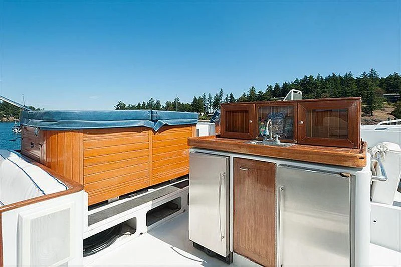 a kitchen with a roof and a pool aboard ALL OF ME Yacht for Sale