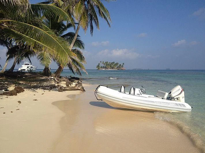 a boat on a beach aboard AZURE II Yacht for Sale