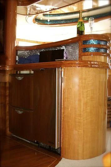 a cabinet with a glass door aboard AZURE II Yacht for Sale