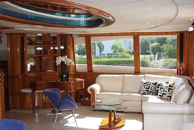 a living room with a couch and a table aboard AZURE II Yacht for Sale
