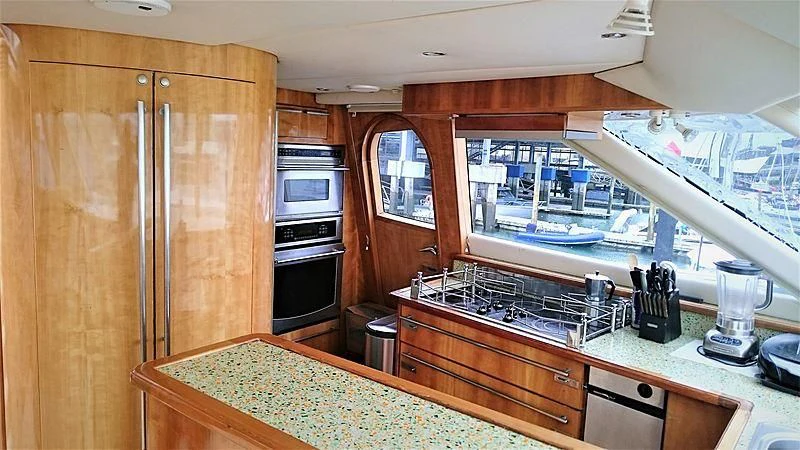 a kitchen with a large window aboard AZURE II Yacht for Sale