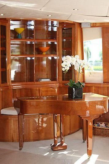a table with vases of flowers aboard AZURE II Yacht for Sale