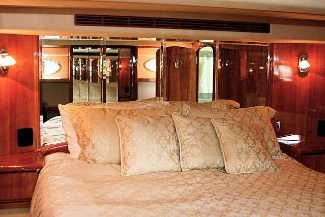 a couch in a room aboard AZURE II Yacht for Sale