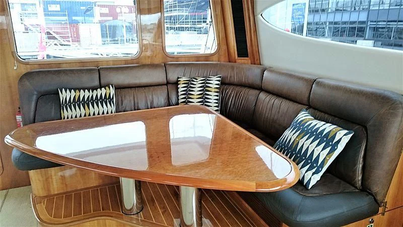 a table with a pillow on it aboard AZURE II Yacht for Sale