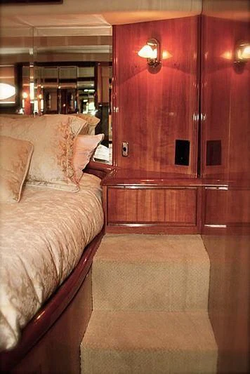 a bed in a room aboard AZURE II Yacht for Sale