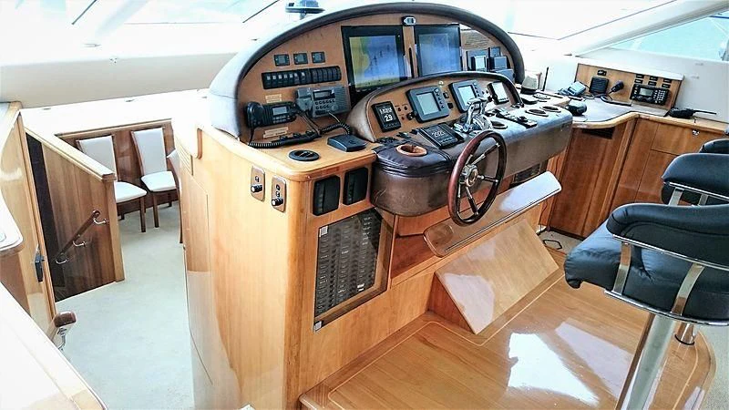 a wooden desk with a computer on it aboard AZURE II Yacht for Sale