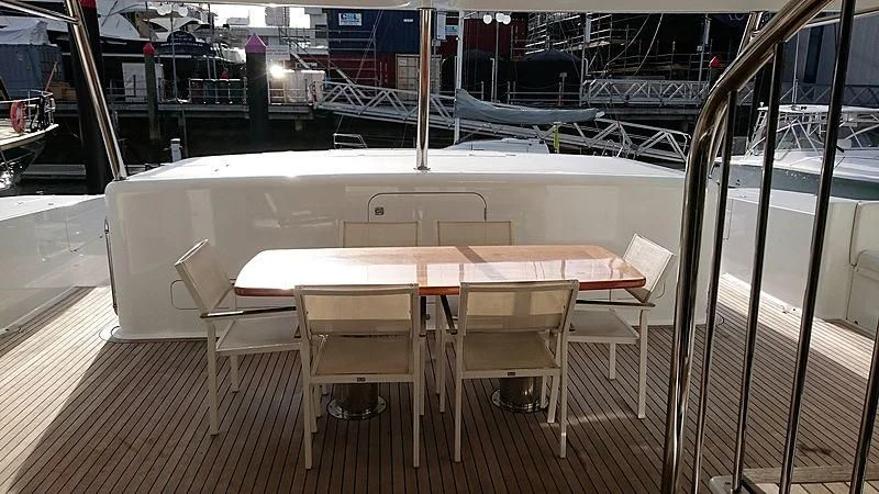 a table and chairs in a room aboard AZURE II Yacht for Sale