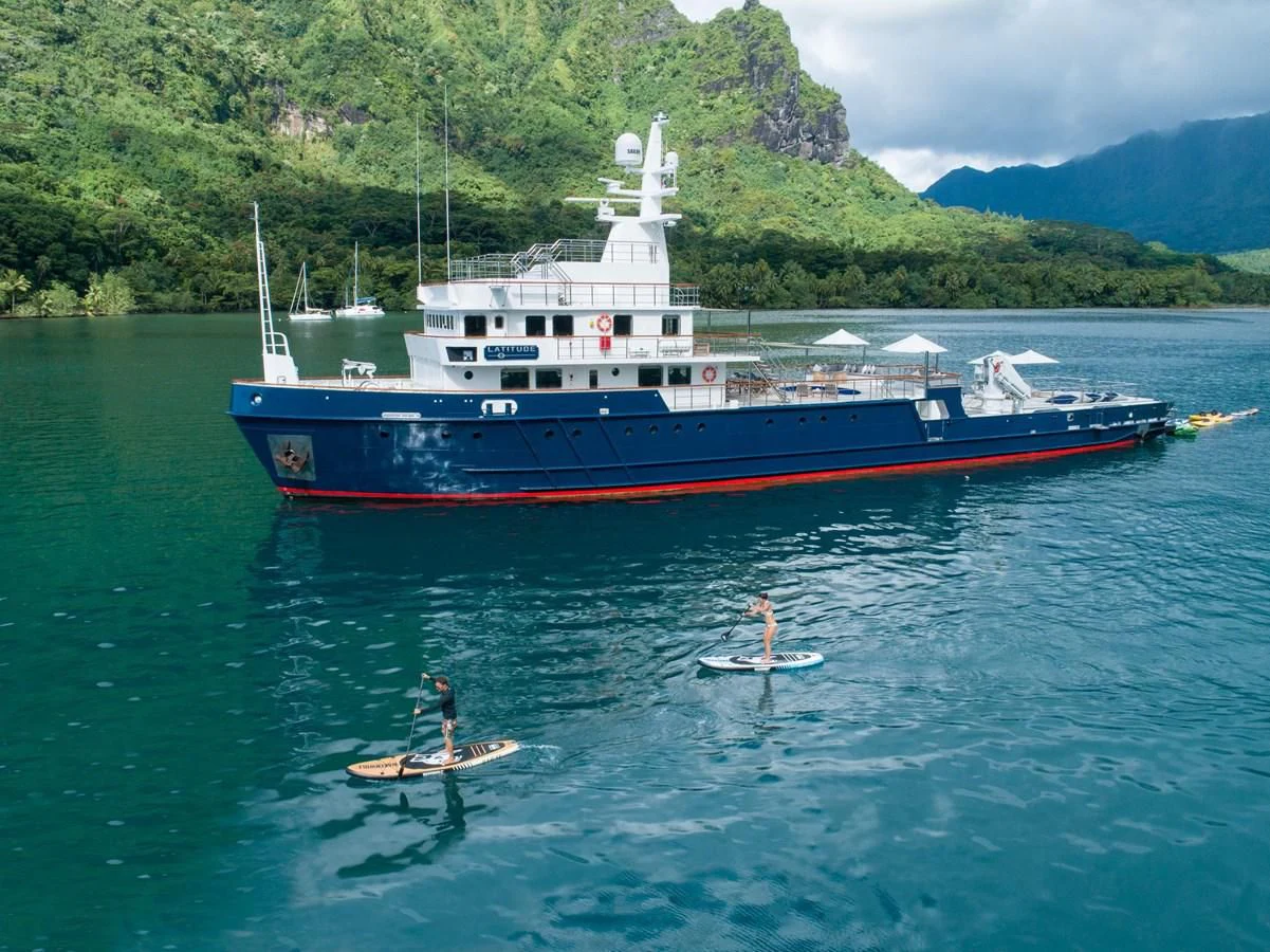 a large boat in the water aboard LATITUDE Yacht for Sale
