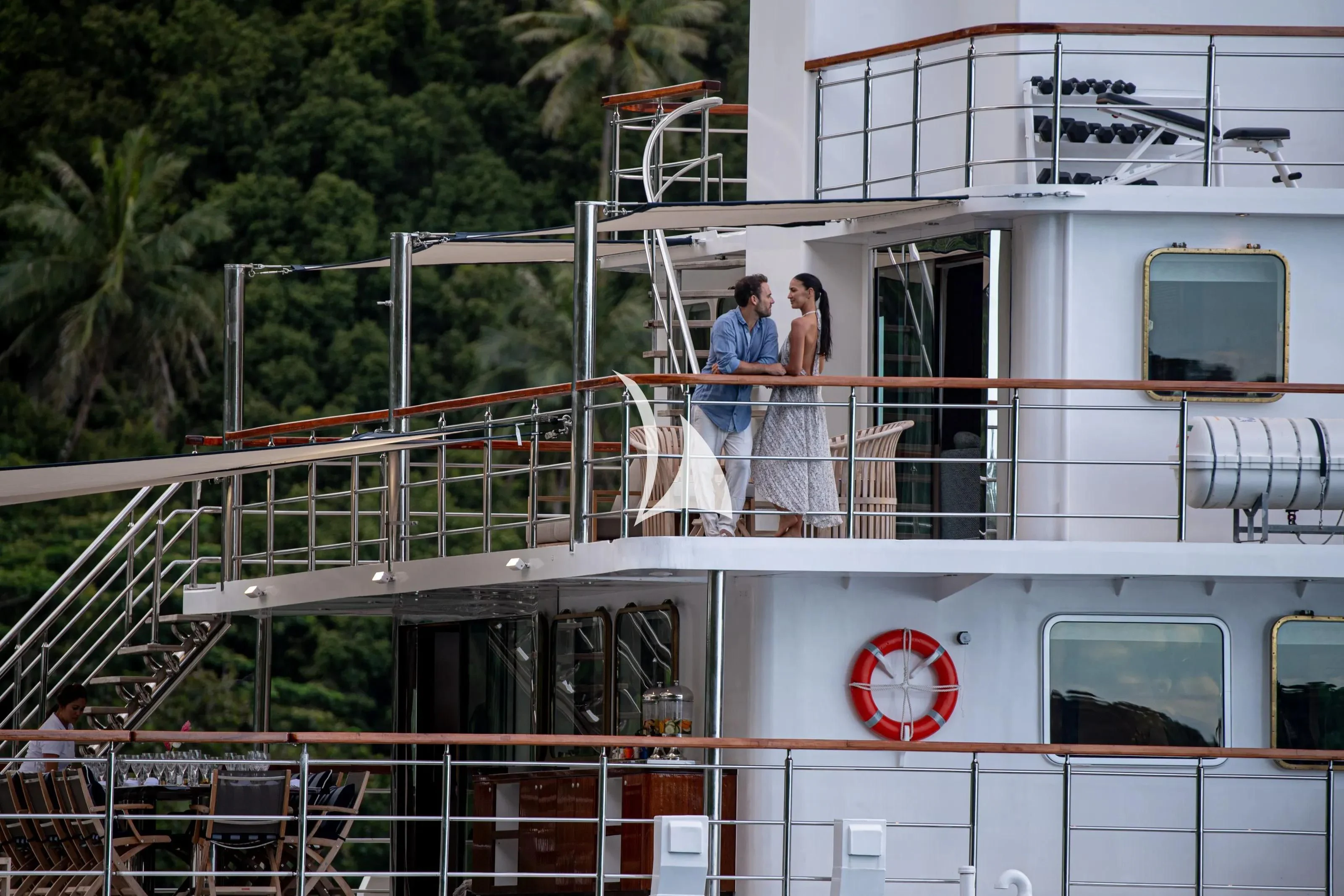 a couple kissing on a boat aboard LATITUDE Yacht for Sale