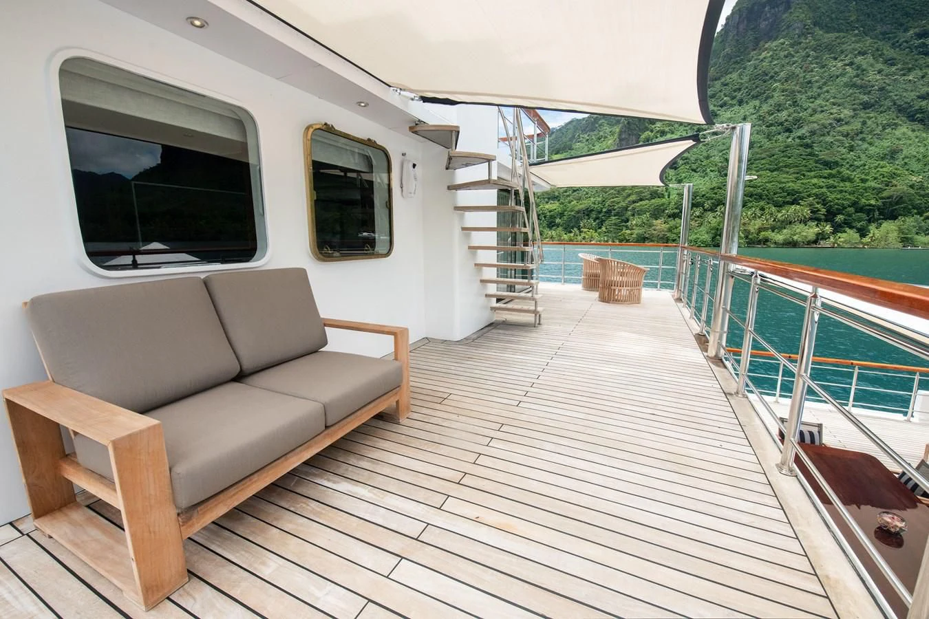 a couch on a deck aboard LATITUDE Yacht for Sale