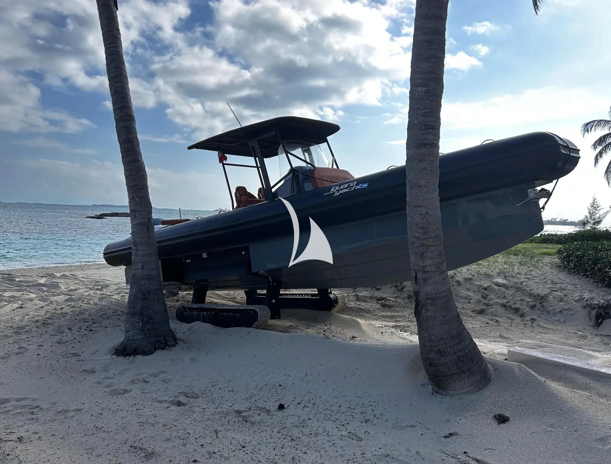 a boat on a beach aboard LATITUDE Yacht for Sale