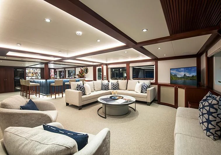 a living room with a large open floor plan aboard LATITUDE Yacht for Sale