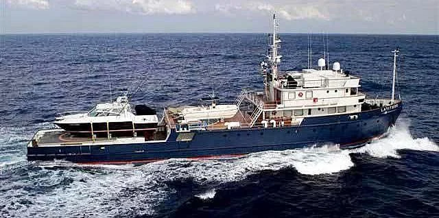 a large ship in the water aboard LATITUDE Yacht for Sale