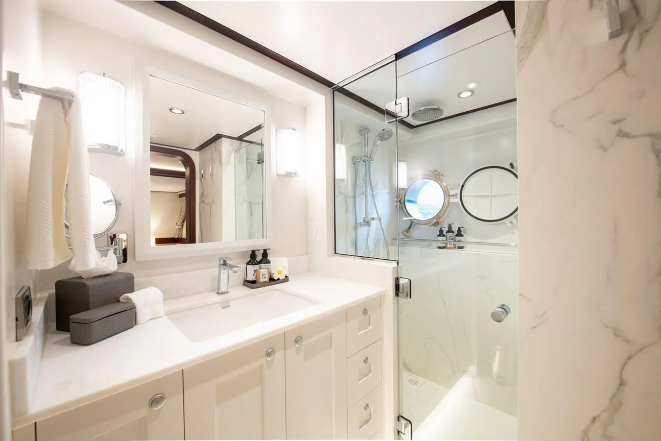 a bathroom with a large mirror aboard LATITUDE Yacht for Sale