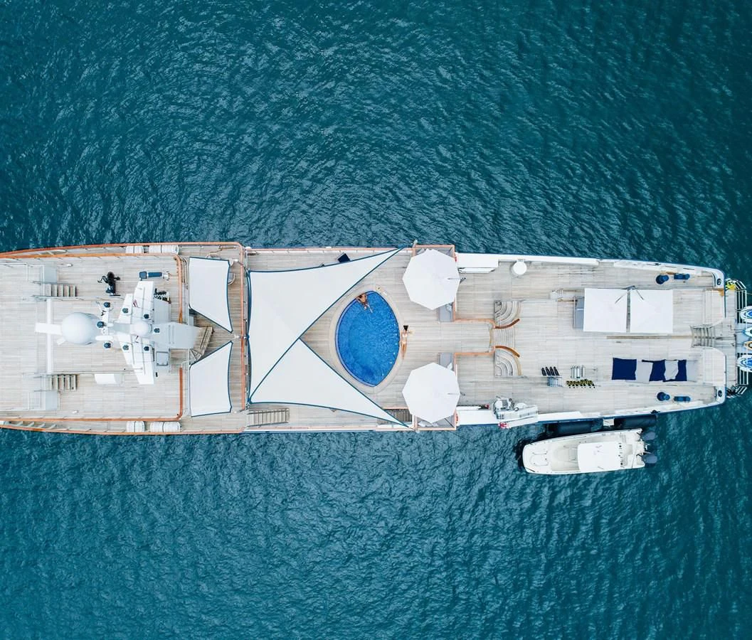 a large ship in the water aboard LATITUDE Yacht for Sale