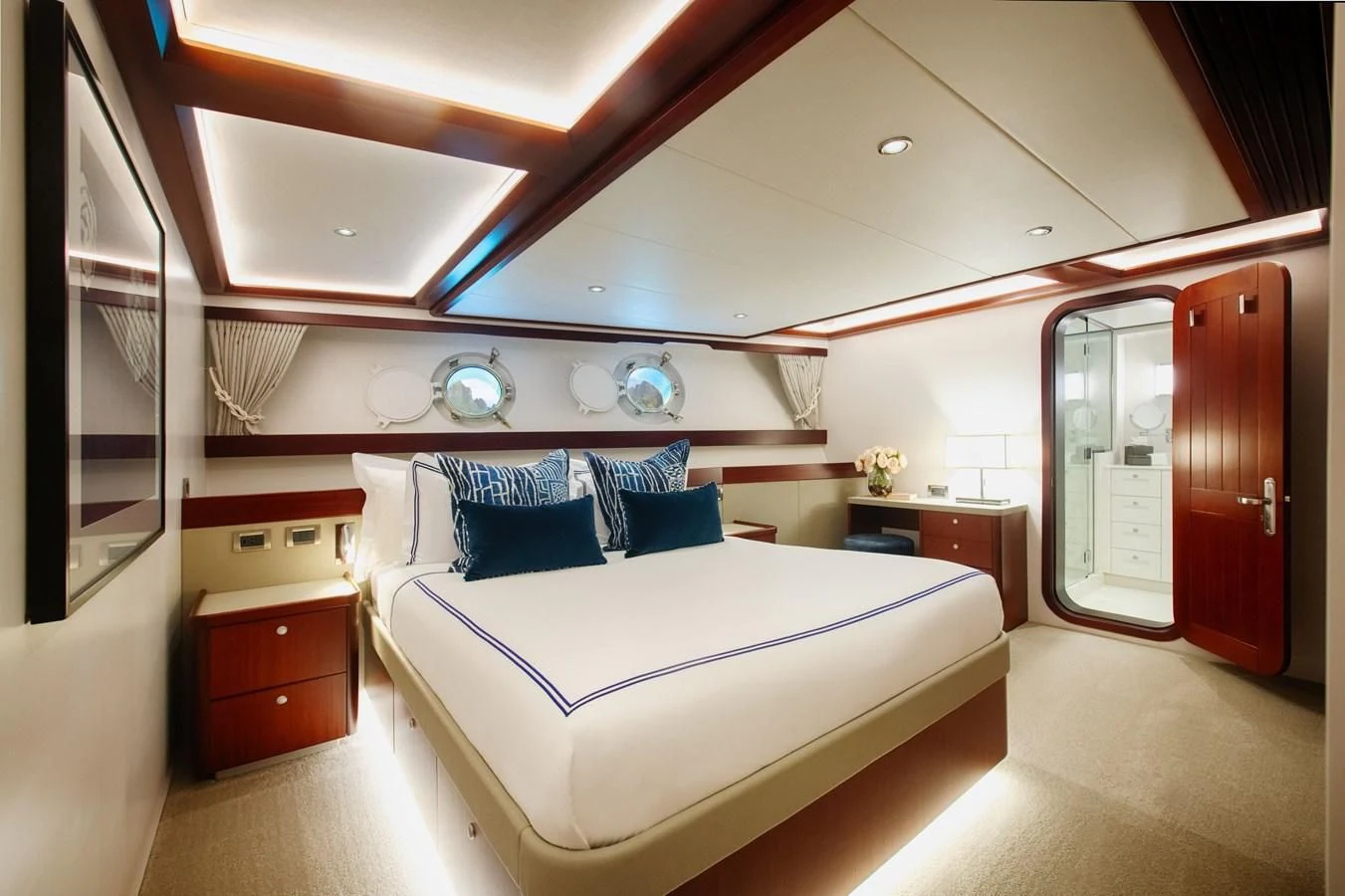a bedroom with a bed aboard LATITUDE Yacht for Sale
